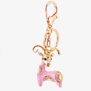 Pink enamel goat keychain with rhinestones and gold-plated ring for car keys or bags