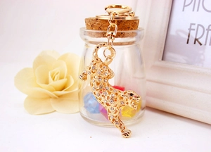 Exquisite gold leopard keychain with sparkling rhinestones and hollow metal craft details