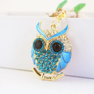 Creative crystal owl keychain featuring blue rhinestones and gold alloy plating