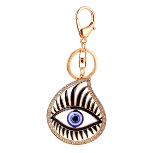 Sparkling crystal evil eye keychain with teardrop shape and golden metal keyring