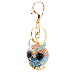 Creative owl keychain with white and blue rhinestones on a gold metal lobster clasp ring
