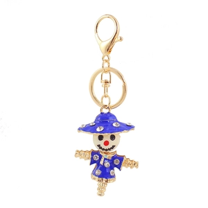 Charming blue scarecrow keychain with sparkling rhinestones and gold metal finish