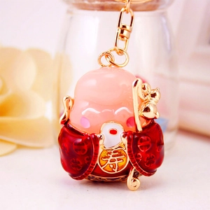 Cute cartoon God of Longevity keychain with Shou character and golden metal clip