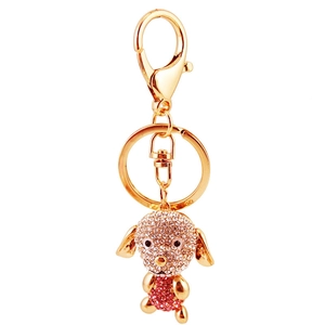 Porte-clés chien en métal doré orné de cristaux roses et blancs avec mousqueton