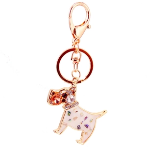 Porte-clés chien caniche étincelant avec finition métal or rose et détails émail