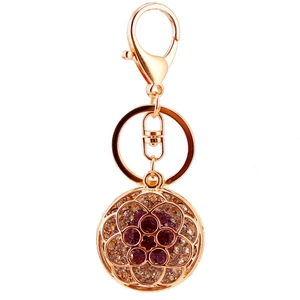 Elegant hollow flower keychain with purple and white crystals on rose gold metal