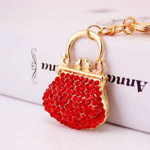 Portachiavi borsa con strass rossi scintillanti in lega dorata per decorazione