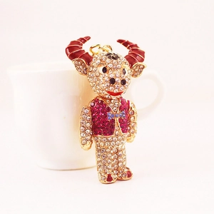 Sparkling crystal ox keychain pendant with gold plating and rhinestones for bag decoration
