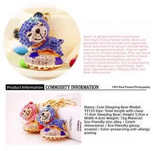 Detailed macro view of crystal bear keychain with pink and blue rhinestones and dimensions