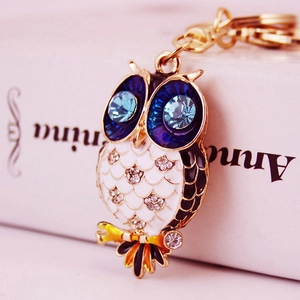 Cute owl keychain with crystal eyes and gold plating, ideal for handbags and car accessories