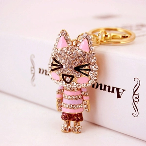 Cute sparkling cat keychain with crystal rhinestones on a gold alloy metal setting