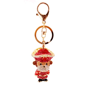 Porte-clés singe en cristal étincelant avec strass et base en métal doré pour voiture