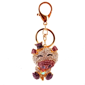 Cute crystal pig keychain with pink and purple rhinestones on a gold metal lobster clasp