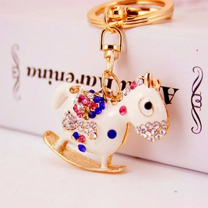 Sparkling rhinestone Trojan horse keychain with colorful crystals and golden hardware