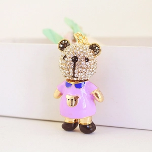 Porte-clés ours exquis avec strass blancs étincelants et accessoire de robe violette