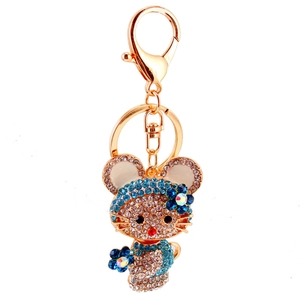 Portachiavi gatto con strass blu scintillanti e ciondoli a fiori in finitura dorata