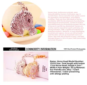 Detail view of rhinestone horse head keychain in gold and silver zinc alloy finish