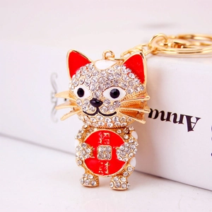 Lucky cat keychain with sparkling crystals and gold metal finish for women handbags