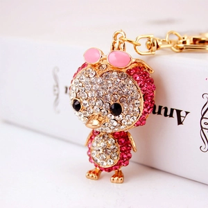 Sparkling owl keychain with white and purple rhinestones and cute pink glasses