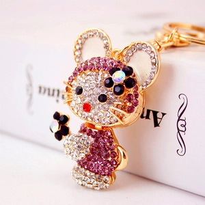Simpatico portachiavi a topo dorato con strass viola e bianchi brillanti ed eleganti