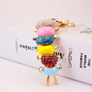 Colorful rhinestone caterpillar keychain accessory with vibrant stacked layers and gold ring