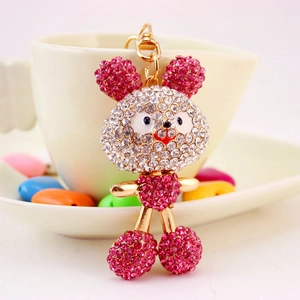 Sparkling crystal rabbit keychain with pink rhinestones on a gold metal frame