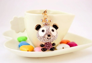 Detailed view of luxury panda keychain with rhinestone crown and sparkling crystals