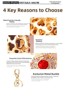 Detail view of gold-plated owl keychain featuring red crystals and seamless welding
