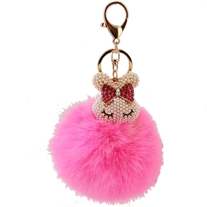 Porte-clés mignon avec pompon en peluche rose, tête de lapin perle et fermoir doré