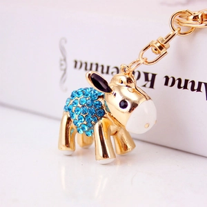 Cute cartoon donkey keychain with sparkling sky blue rhinestones and gold-plated ring