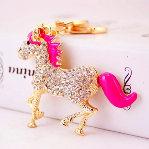 Sparkling horse keychain with white rhinestones and pink enamel for luxury handbags