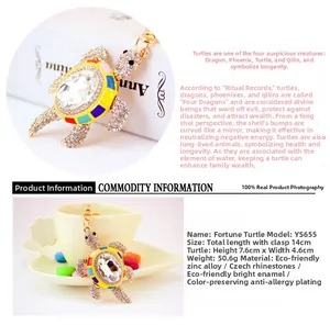 Detailed macro view of crystal rhinestone turtle pendant with colorful enamel and key ring