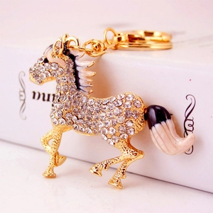 Sparkling crystal horse keychain charm with gold alloy and enamel detail for bags