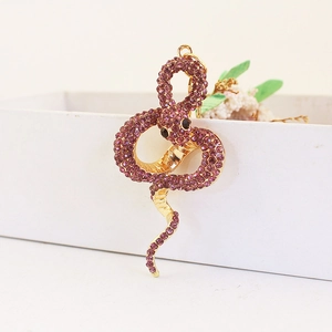 Porte-clés serpent doré raffiné avec strass violets et yeux en pierres précieuses