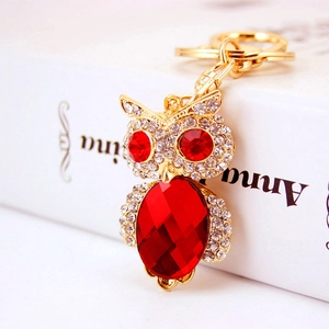 Cute crystal owl keychain with red rhinestones and gold plating for women's bags