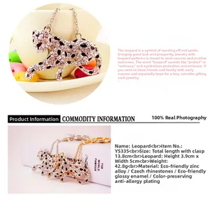 Close-up of leopard keychain with white and black crystals on eco-friendly zinc alloy
