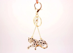 Detail view of leopard keychain with crystal rhinestones and gold lobster clasp