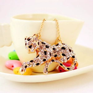 Sparkling crystal leopard keychain pendant with golden plating and black enamel spots
