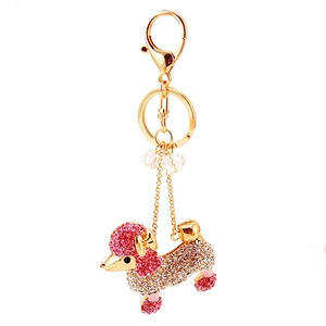 Porte-clés caniche en cristal charmant avec strass roses et transparents sur métal