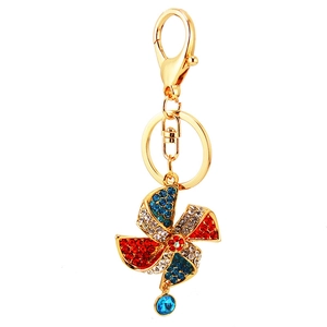 Golden windmill keychain with sparkling colorful rhinestones and lobster clasp