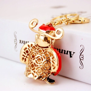 Chinese God of Wealth keychain in gold finish with red enamel and hollow cloud pattern