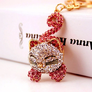 Porte-clés chat mignon avec strass blancs et roses sur un alliage métallique plaqué or