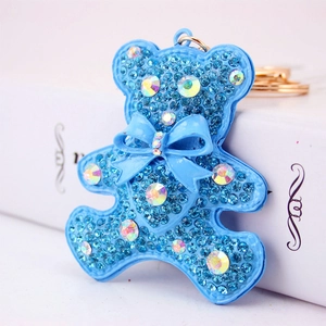 Sparkling light blue rhinestone bear keychain with bow and golden metal hook accessory