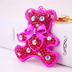 Sparkly crystal rhinestone bear keychain with pink bow and gold ring accessory