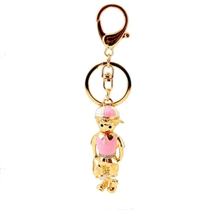 Cute cartoon boy and girl couple keychain with pink enamel and sparkling rhinestones
