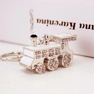 Silver steam locomotive keychain with white enamel and sparkling rhinestones for men