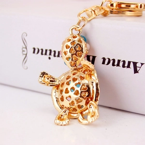 Creative gold turtle keychain with rhinestone heart hollow shell and colorful beads inside