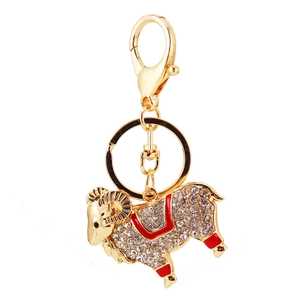 Porte-clés chèvre étincelant serti de diamants, plaqué or avec accents de selle en émail