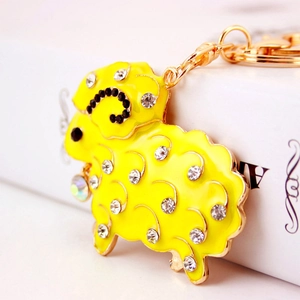 Cute yellow rhinestone sheep keychain with gold alloy finish and sparkling crystals