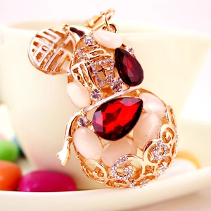 Chinese style gourd keychain with red crystals, opal stones and a gold Fu charm